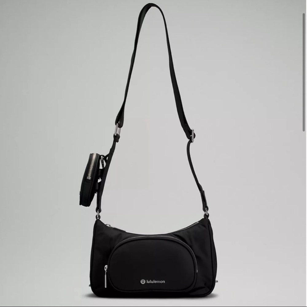 NWT black lululemon nano pouch purse. sold out everywhere
